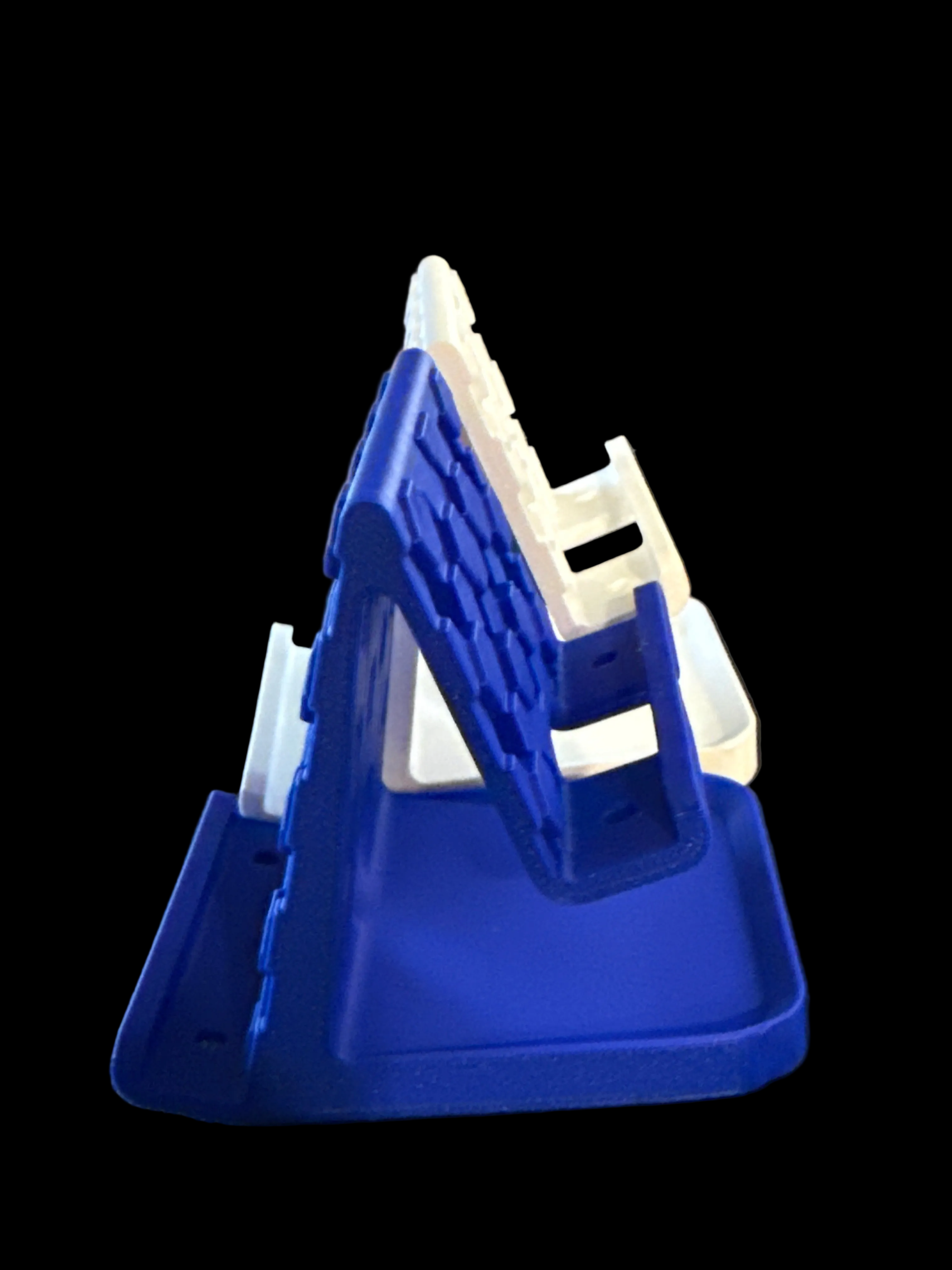 Multi-functional geometric phone stand